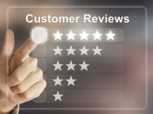 a man pointing to a box that will rate the customer reviews indicating how it is important for multiple location seo