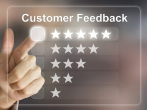 a person pointing on costumer feedback rating indicating costumer testimonial